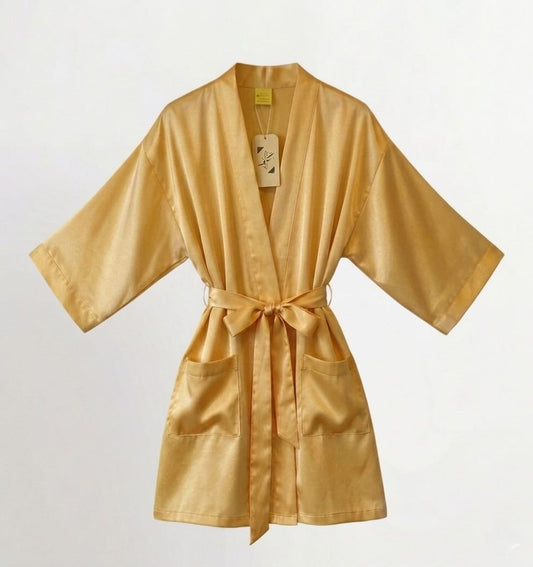 Gold satin robe on a white background